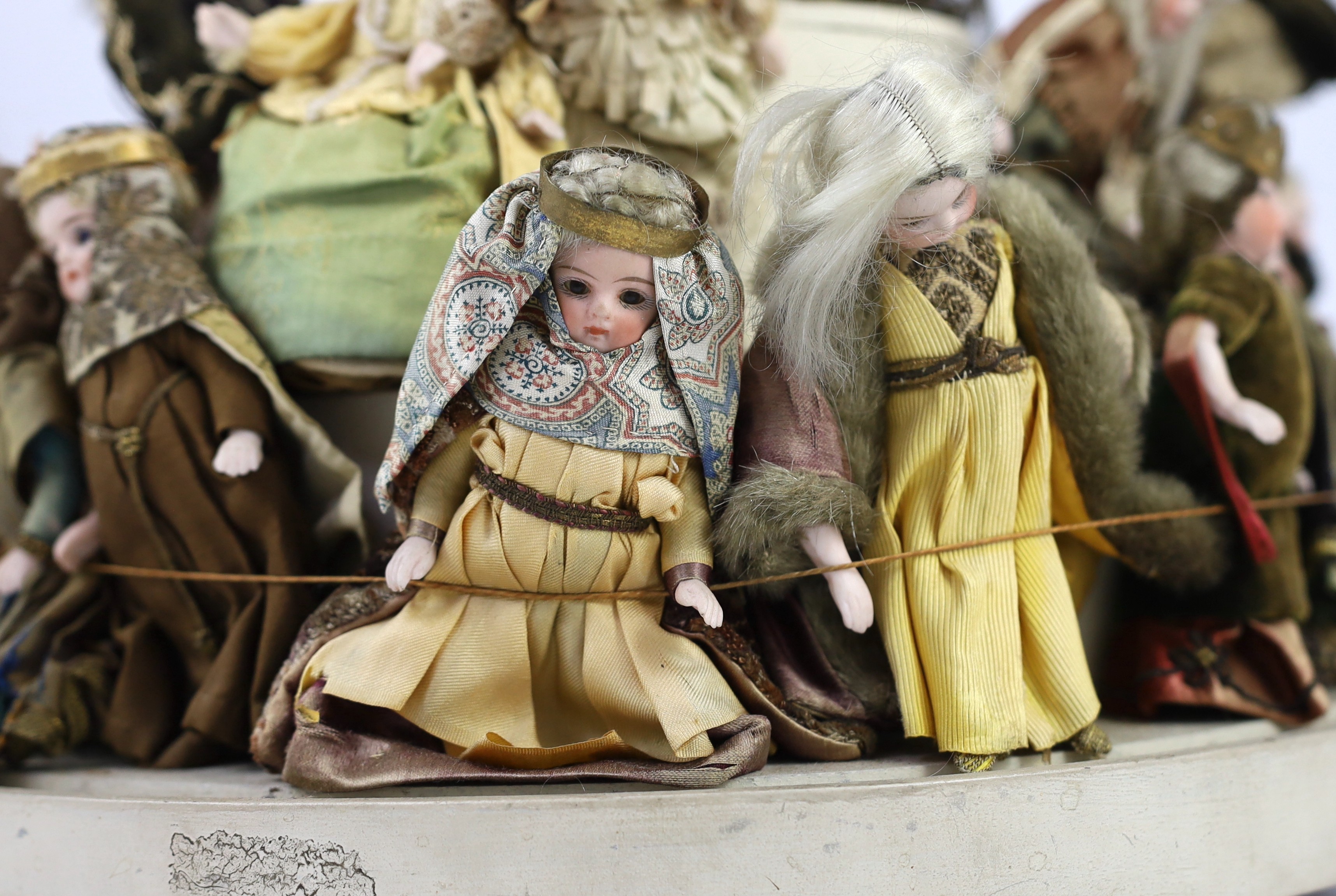 A rare collection of twenty-three German all-bisque dolls, circa 1910